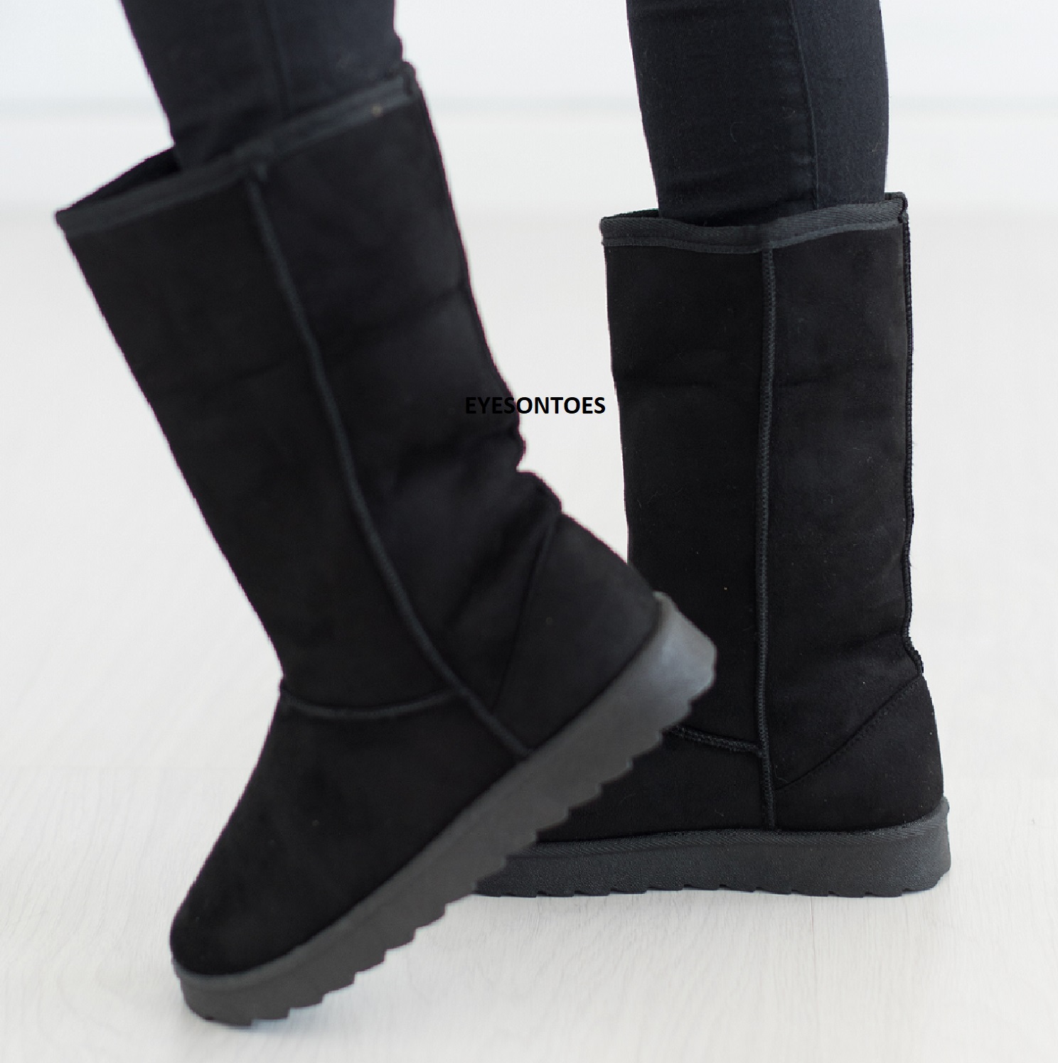 black calf hugging boots